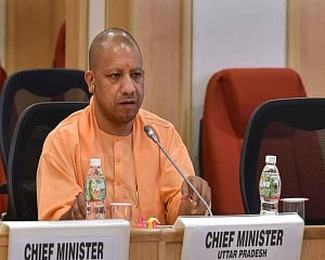 Saffron bedsheets in Rae Bareli hospital for Yogi's visit