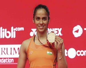 Saina claims Indonesia Masters after injured Marin limps out of final