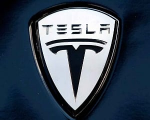 Tesla slams critic with restraining order