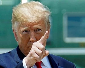 Trump says his talk with Putin 'none of your business'