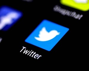 Twitter removes conspiracy account following Trump retweet