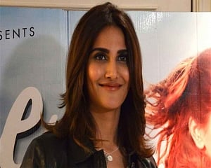 Vaani oozes oomph in neon green monokini