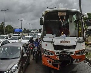 Woman's head severed after she leans out of bus to vomit