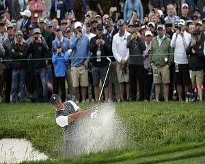 Woods posts 1st round under par at US Open in 7 years