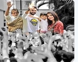 Amitabh shares family photo, says 'We hear your prayers'