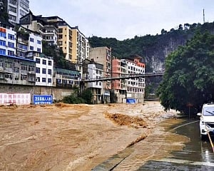 At least 12 killed in flooding in southwestern China