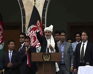 Blasts heard as duelling Afghan leaders swear themselves in