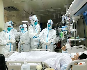 Built in 10 days, China's virus hospital takes 1st batch of patients