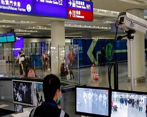 China virus city in transport shutdown as WHO extends talks