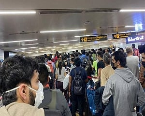 Coronavirus: Passengers wait for hours to undergo screening at Delhi airport