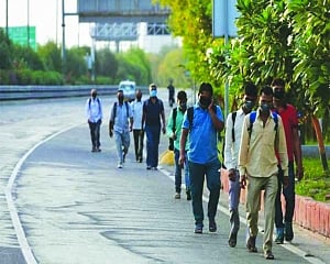 Firms offer air tickets, more wages to entice migrants to join back