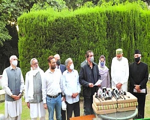 Gupkar Alliance members  celebrate win separately