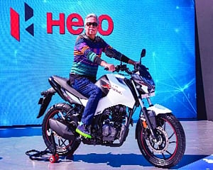 Hero MotoCorp shares shed early gains; settle marginally higher
