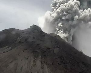 Indonesian volcano spews massive ash cloud