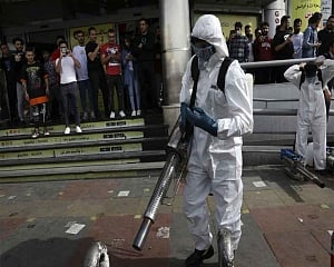 Iran says virus kills another 97, pushing death toll to 611
