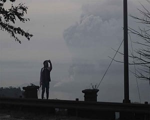Philippines on alert as volcano spews ash, lava