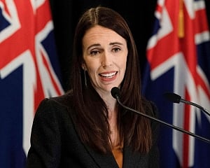 New Zealand PM takes pay cut as virus hits economy