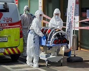 South Korea virus cases spike, as Italy and Iran take drastic steps