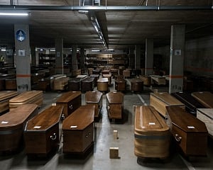 Spain's virus death toll tops 18,000: official