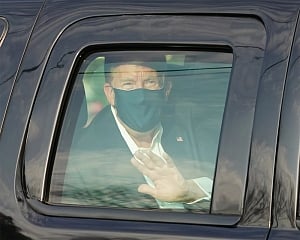 Trump''s surprise drive-by to greet supporters outside hospital