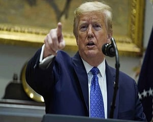 Trump says US topping world coronavirus cases is 'badge of honour'