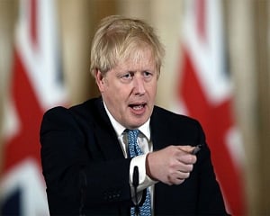 UK PM plans law banning large gatherings as COVID-19 cases rise