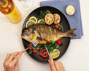 2 servings of fish per week may help prevent recurrent CVD