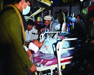 72 killed in ISIS attacks on Kabul airport