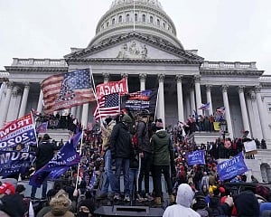 Capitol rally seeks to rewrite January 6 by exalting rioters