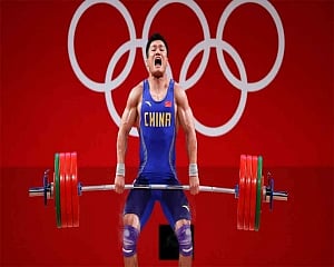 Chinese Lyu becomes oldest weightlifter at 37 to win Olympic gold