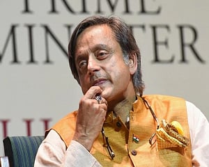 Court defers order on whether to put Tharoor on trial in his wife Sunanda's death case