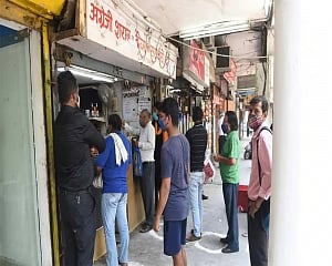 Delhi govt orders liquor vends to deploy marshals at shops to ensure  Covid-appropriate behaviour