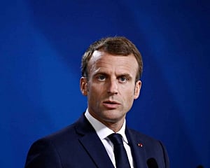 France's Macron orders all health workers to get vaccinated
