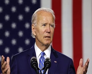 Hitting latest vaccine milestone, Biden pushes shots for all