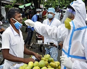 India reports 94,052 fresh Covid cases, highest single-day death toll of 6,148