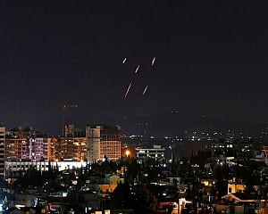 Intense Israeli airstrikes in east Syria said to kill dozens
