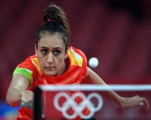 Manika stuns world number 32 to reach third round