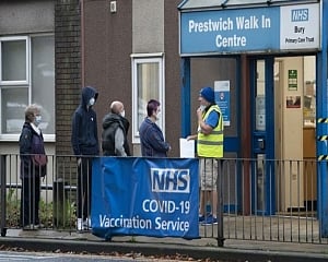 New Omicron cases in UK nearly double in a day