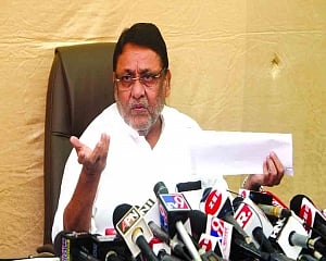 PM’s security  compromised by Fadnavis: Malik