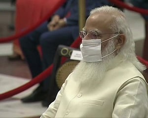 PM Modi rejigs Cabinet; Sonowal, Scindia brought in; 12 ministers exit