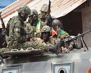 Soldiers detain Guinea's president, dissolve government