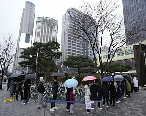 South Korea sets new virus record as officials plan restrictions