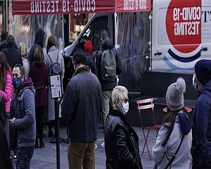US faces a double coronavirus surge as omicron advances