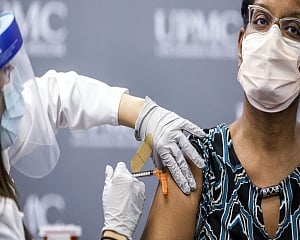 US shifts to speed COVID shots as cases and deaths rise