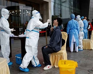 Beijing preps COVID-19 hospital spaces, though new cases low