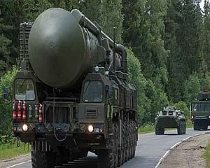 Biden douses fear of nuclear war but pledge of fighter jets to Ukraine could escalate fighting