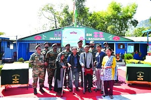 Changlang Battalion of Assam Rifles distributes wheelchairs, walking sticks and hearing aids