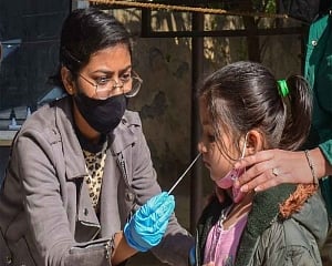 India logs 1,033 new COVID-19 cases