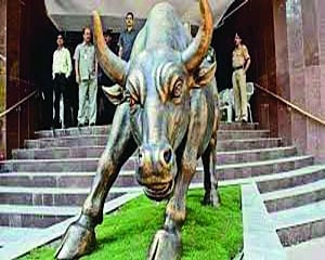 Markets pare gains to end flat in volatile trade; Sensex slips 38 pts