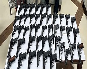 Married couple held for smuggling 45 hand guns at Delhi airport: Customs